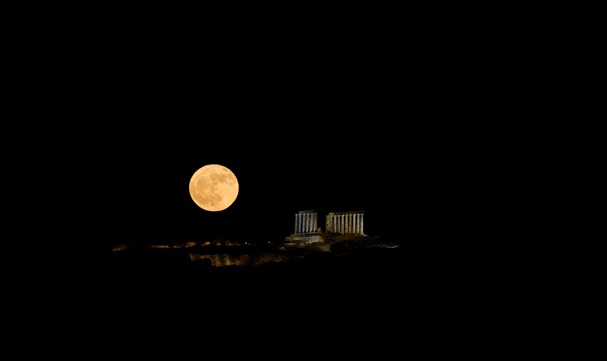 full moon over temple of Poseidon at Cape Sounio