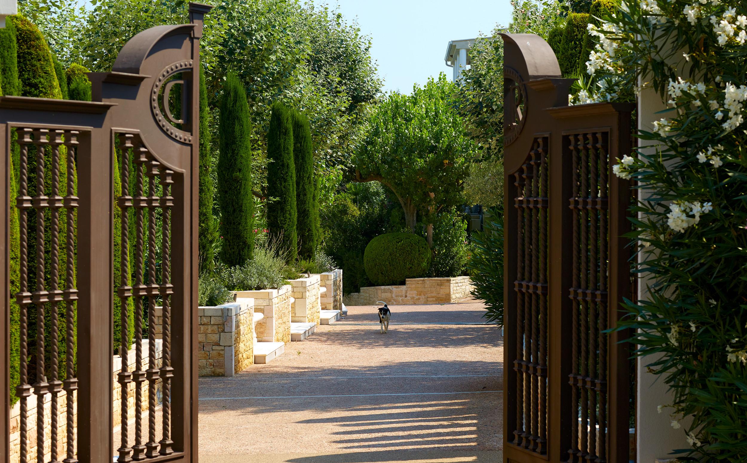 Danai Beach Resort, Greece, entrance, gate, dog , garden