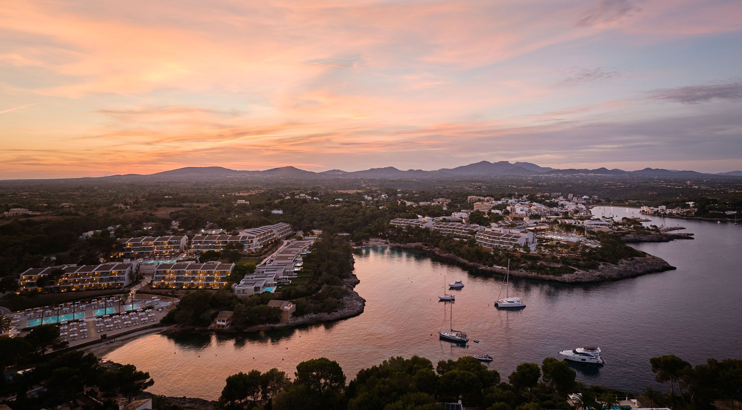 Ikos Porto Petro, Aerial general view, sunset