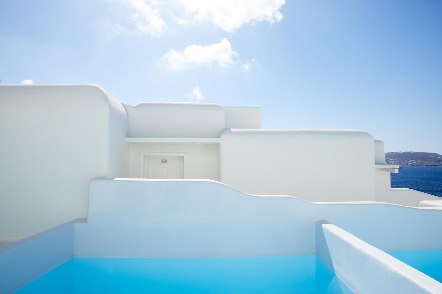 cycladic architecture with pool at Cavo Tagoo Mykonos