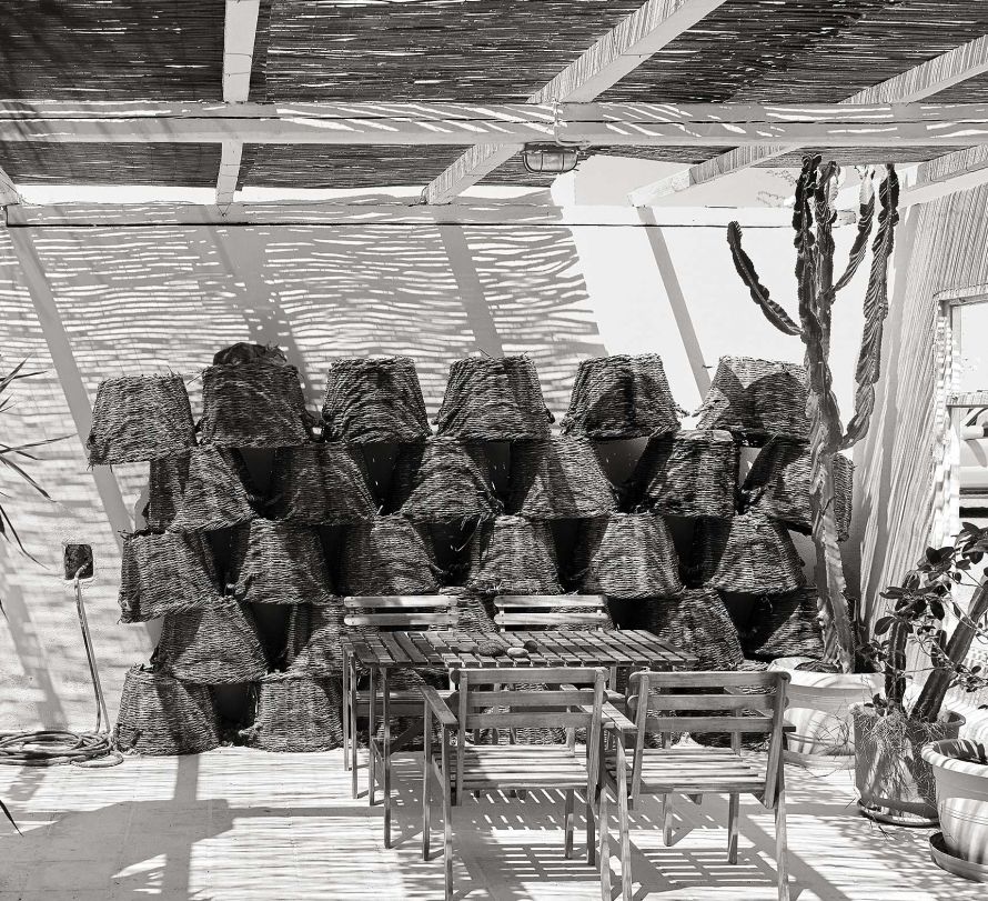 Gaia winery with baskets for harvesting stored on wall