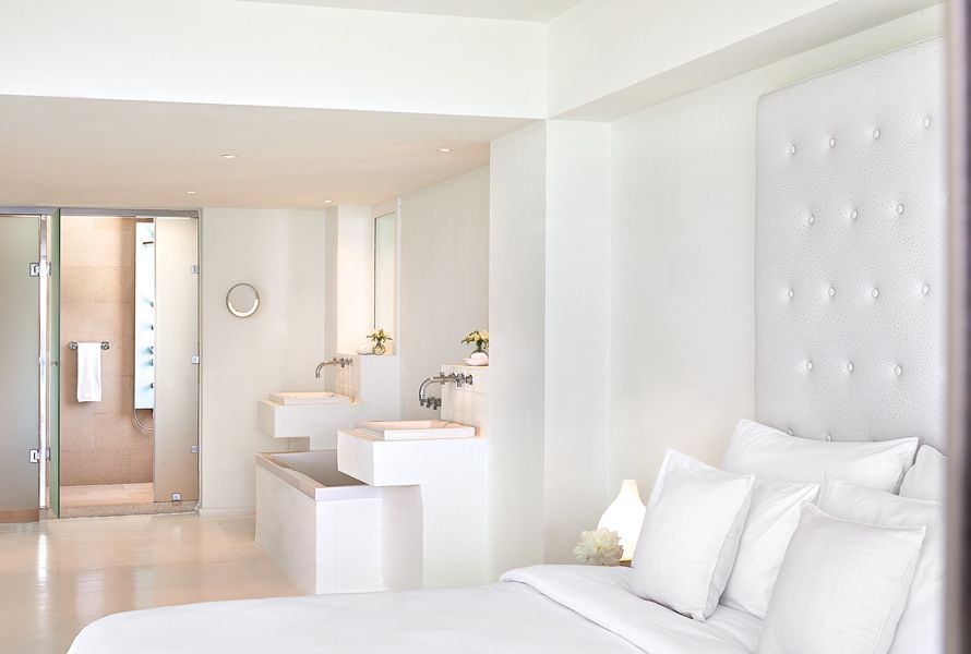 Grecotel Amirandes suite , bed with bathroom