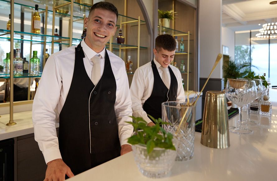 Grecotel Corfu Imperial, two bartender smiling