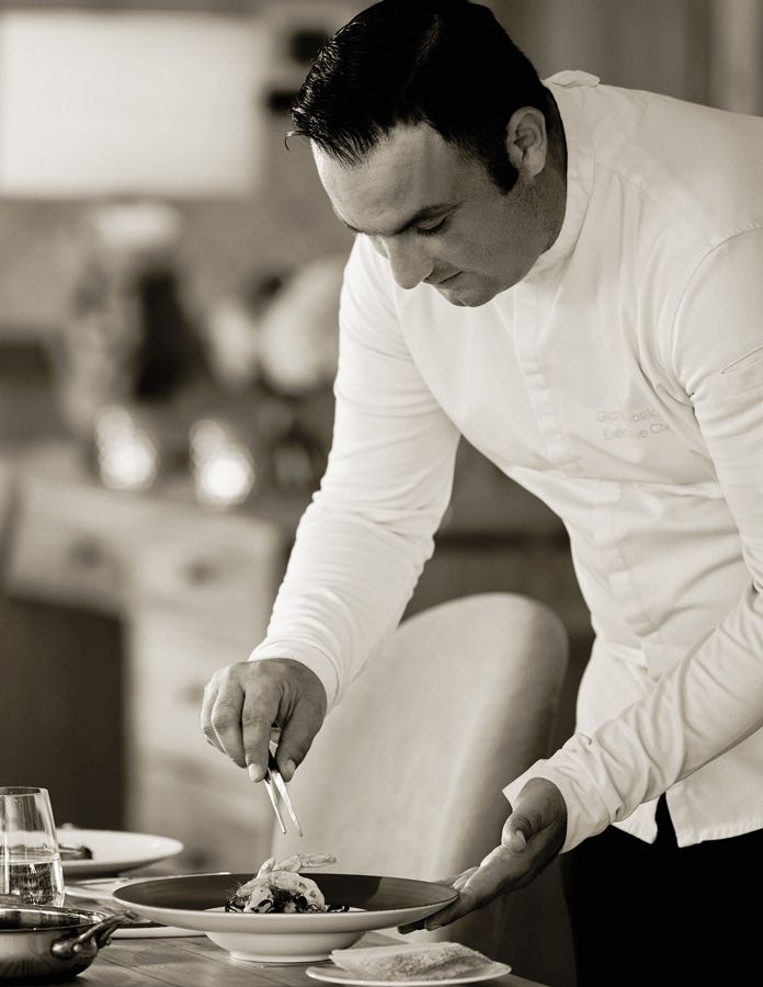 Ikos Olivia Greece, chef preparing dish at Provence Restautant