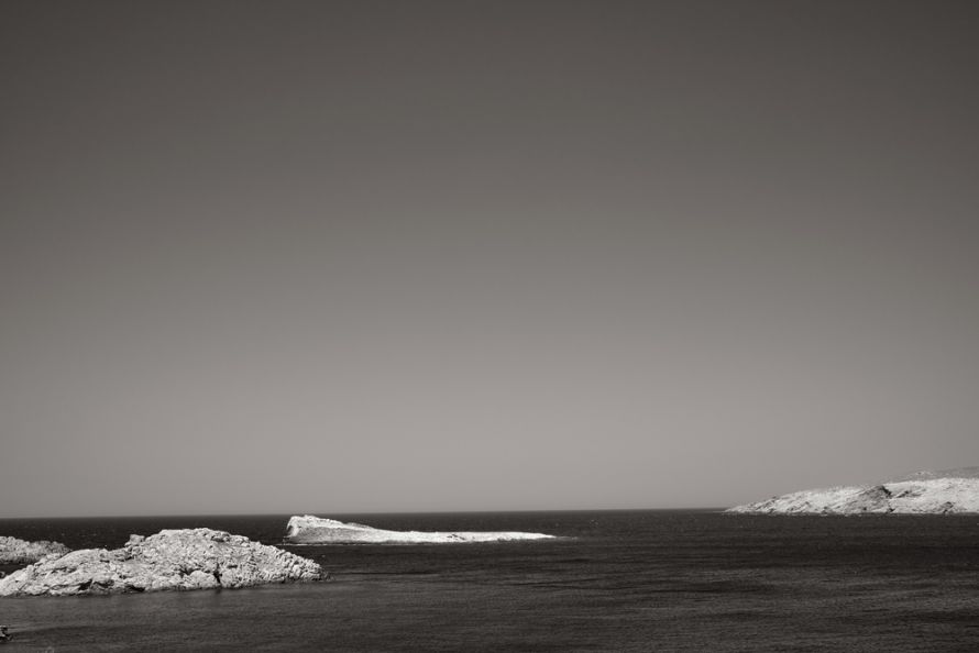 black and white the sea with rocks Mykonos