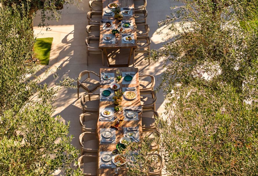 Ikos Porto Petro long table with dishes , bird's view